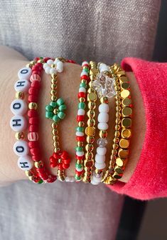 Christmas Bracelet Stack Mix and match your favorite Christmas bracelets CARING TIPS FOR YOUR JEWELRY ⭐️Treat and store with care. ⭐️ For longevity, avoid exposing your jewelry to water. ⭐️ Avoid having direct contact with lotions, perfumes, sanitizers as these chemicals may cause discoloration of your jewelry. Kandi Cuff Ideas, World Of Wearable Art, Make Clay Beads, Christmas Jewelry Diy, Kandi Cuffs, Holiday Bracelets, Preppy Bracelets, Bracelets Etsy, Kandi Cuff