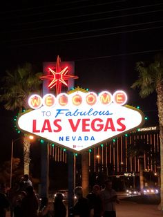 the welcome to fabulous las vegas sign lit up at night