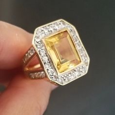 Comes With A Nice Gift Box. Truly An Excellent Deal! Stunning Piece! Huge Statement Ring. 100% Genuine Citrine And White Topaz. Exactly As Photos. Solid 14k Stamped, Also Verified & Tested By Jeweler. Heavy Approx 9.1 Grams!!! Center Stone Is Approx 5cts!!! Sparkling Topaz Are Approx 3cts. Size 7.25. I Collect And Only Sell Genuine Gems Jewelries, So If You Are Into Fine Jewelries, Checkout My Closet For More Nice Pieces. Sorry This Item Cannot Be Bundled With Any Other Items. As Always, Reasona Formal Yellow Topaz Ring With Accent Stones, Yellow Topaz Ring With Center Stone For Formal Occasions, Luxury Yellow Topaz Ring For Anniversary, Formal Yellow Topaz Ring With Center Stone, Yellow Topaz Center Stone Ring In 14k Gold, Yellow Gold Octagon Topaz Ring For Anniversary, Yellow 14k Stamped Jewelry For Anniversary, Formal 14k Yellow Gold Rings, Yellow Emerald Cut Topaz Ring With Prong Setting