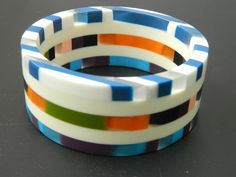 you will receive 1 piece of Multi Color Resin Jewelry Bangle Bracelet Wide Bracelet Resin Art Exclusive Stacking Bohemian Unique vintage Jewelry handmade jewelry Gift Inner diameter= 2.6" approx. Bangle width=   1.2" approx. Quantity: 1 Piece Thank you very much for visiting! Any questions, please feel free to contact us. Discount for bulk provide. Handmade Multicolor Bangle Jewelry, Handmade Retro Bracelets As Gift, Retro Multicolor Bracelets As Gift, Multicolor Retro Bracelet For Gift, Multicolor Retro Bracelets For Gift, Multicolor Retro Bracelet As Gift, Retro Multicolor Bracelets For Gift, Handmade Retro Bangle For Gifts, Vintage Handmade Multicolor Bracelets