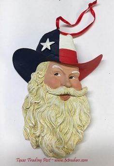 an ornament with a hat and beard on it