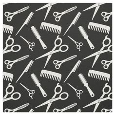 scissors and combs on a black background stretched out to be used as a wallpaper