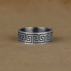 Ancient Greek Meander Promise Men Ring, Grecian Men Silver Wedding Band Ring, Sterling Silver Mythology Ring, Gift For Husband Made of 925 silver and handcrafted by hand, this ring is not only an accessory piece that complements your daily elegance, but also has details that will reflect your character and style. It is also a great gift to give to your loved ones on their special days. At SavisSilver, we always give importance to the satisfaction of our customers, we recommend you to read the fo Greek Rings, Greek Meander, Greek Men, Greek Ring, Silver Wedding Band, Silver Wedding Bands, Men Ring, Wedding Band Ring, Men Jewelry