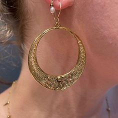 This perfect pair of intricately textured, bold yet timeless hoops are a wonderful addition to any outfit. Vintage, handmade in 14k vermeil and base metal Earrings measure approx. 43mm x 12mm Because we do all our restoration work by hand, we can offer a huge array of customization. If you have inquiries about sizing, alterations, or engraving, you can inquire about a quote here. As with all antiques, this piece is one-of-a-kind and can sell at any time. All vintage and antique sales are final. Exceptions might be made based on special circumstances. Intricate Brass Hoop Earrings, Pierced Round Recycled Gold Earrings, Pierced Round Earrings In Recycled Gold, Elegant Crescent Brass Hoop Earrings, Elegant Crescent Shaped Brass Hoop Earrings, Pierced Round Recycled Gold Jewelry, Round Recycled Gold Pierced Jewelry, Recycled Gold Round Jewelry, Round Recycled Gold Jewelry