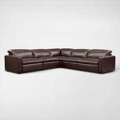 a brown leather sectional sofa on a white background