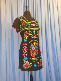 Black Folk Embroidered Summer Dress, Black Cotton Folk Dress, Black Folk Style Cotton Dress, Embroidered Short Sleeve Dress For Festive Occasions, Fitted Black Cotton Embroidered Dress, Fitted Cotton Embroidered Black Dress, Traditional Black Summer Dress, Black Fitted Cotton Embroidered Dress, Traditional Short Sleeve Dress With Embroidered Border