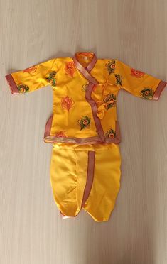 This traditional Indian Rayon Dhoti Kurta Peacock feather Print Dress will surely add charm to your cute boy. SALES PACKAGE - 1 Kurta, 1 Dhoti FABRIC - Rayon - Soft Cloth for baby. OTHER DETAILS - It has a soft elastic belt for convenient fitting on the waist. Delivery time ranges between 11 - 18 working days. we provide a Express Shipping Also 5-7 days with Extra charge, You may choose in shipping Option. * You May Conversation With Me if You have any doubt. Thank you so much to visit my shop. Rajesh Bansal owner of Rajasthani Dresses Festive Peacock Design Sets, Traditional Sets With Peacock Design For Festivals, Traditional Festival Sets With Peacock Design, Traditional Festive Sets With Peacock Design, Traditional Peacock Design Sets For Diwali, Traditional Diwali Sets With Peacock Design, Festive Traditional Sets With Peacock Design, Festival Sets With Peacock Design, Festive Multicolor Peacock Design Sets