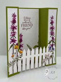 an open card with flowers on it