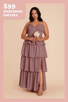 the bridesmaid dresses are $ 99 and have an asymmetrical tiered skirt