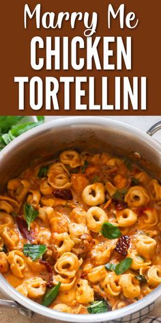 a large pot filled with tortelli and sauce