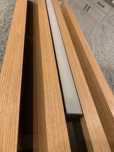 an open laptop computer sitting on top of a wooden desk