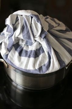 a cloth is sitting on top of a pot