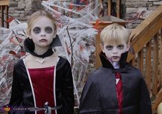 two children dressed up in costumes for halloween