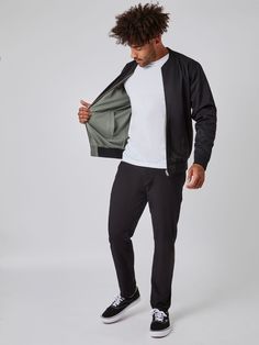 Double the style, double the comfort. Our Mercury Green and Black Reversible Bomber is a cold-weather essential with a modern fit and durable construction. Enjoy the look of luxury and the feel of warmth all season long. Stay stylish, stay warm, and stay on budget with this versatile, reversible jacket. Jacket is completely reversible, even the pockets and zipper One style is water-resistant woven fabric; other style is 5.3 oz French Terry Premium brushed nickel hardware Ribbed fabric at waist a Casual Outerwear For Work, Urban Outerwear With Ribbed Cuffs For Layering, Brushed Nickel Hardware, Reversible Jacket, Nickel Hardware, Green And Black, Ribbed Fabric, Feeling Great, Modern Fit