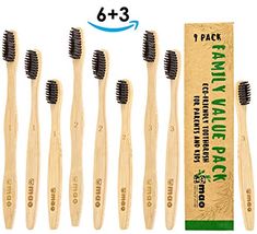 six bamboo toothbrushes are lined up next to each other with the package in front