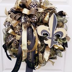 a new orleans saints wreath on the front door