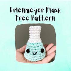 a hand holding a small crocheted blue and white object with the words friemeyer flask free pattern