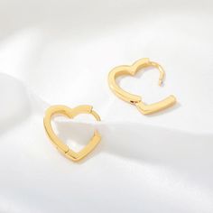 Elia Heart Hoop Earrings Part of The Kindness Collection. $2 from every item sold is donated to our featured nonprofit. Click here for our current Kindness Collection nonprofit partner information. The Elia Heart Hoop Earrings are a stylish and fashion-forward way to show your heart for Valentine's Day, Galentine's, or any other day. These earrings make a great gift that gives back because every purchase donates to charity. Show your love and make a difference with these Elia Heart Hoop Earrings Nickel-free Huggie Earrings For Valentine's Day, Trendy Hypoallergenic Hoop Earrings For Valentine's Day, Trendy Huggie Heart Earrings For Valentine's Day, Hypoallergenic Huggie Earrings For Valentine's Day Gift, Minimalist Huggie Earrings For Everyday And Valentine's Day, Hypoallergenic Hoop Earrings For Valentine's Day, Trendy Huggie Earrings For Valentine's Day, Hypoallergenic Open Heart Huggie Earrings As Gift, Open Heart Huggie Earrings For Valentine's Day