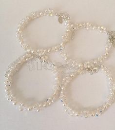 Handmade to order using Swarovski crystals in clear AB and white pearls are shown. Other colours available under custom request. Pearl Beaded Bracelet, Birthday Bracelet, Bracelet Crystal, 30th Birthday Gifts, 21st Birthday Gifts, Bridal Bracelet, Feather Necklaces, Wedding Jewellery, Day Wedding