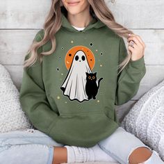 Halloween Ghost Hoodie,Cute Halloween Hoodie,Spooky Season Hoodie,Trick or Treat Hoodie,Cute Fall Hoodie,Womens Halloween Gift,Gift for Her ### About Our Products -Youth hoodies do not include drawstrings for added safety. 🚫✨ - Our garments are crafted from a blend of 50% Cotton and 50% Polyester, ensuring both comfort and durability. - The medium-to-heavy weight fabric ensures long-lasting wear. - For your convenience, a tear-away label is included. - It provides a loose, comfortable fit that maintains true-to-size proportions. ### Find Your Fit Our hoodies are designed to fit true-to-size, offering a relaxed and stylish fit. Please refer to our detailed size chart with images to find your perfect size. ### Placing an Order 1. Review the product images and size charts for detailed inform Halloween Hoodies, Ghost Hoodie, Hoodie Cute, Halloween Hoodie, Fall Hoodies, Youth Hoodies, Halloween Ghost, Halloween Women, Halloween Gift