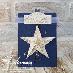 a blue and white card with a gold star on the front that says best & brightest holiday season