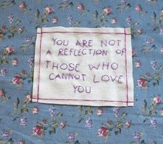 a piece of paper with writing on it that says you are not a reflection of those who cannot love you