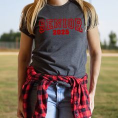 It's your last year! Senior Class of 2025. Choose your t shirt color (available in Ladies and Men's Unisex styles) and then choose or color print (see the color options in the photo gallery). This will be your Last First Day of High School! Red Custom Print Tops For College, Casual Screen Print Tops For College Events, Casual Screen Print Tops For College, Short Sleeve Tops With Text Print For College Events, Text Print Short Sleeve Tops For College Events, Casual Shirt With Letter Print For College Events, Short Sleeve T-shirt With Text Print For College Events, Custom Print Crew Neck T-shirt For College, Custom Print Cotton T-shirt For College Events