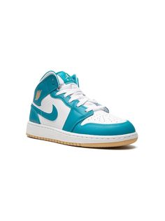 Air Jordan 1 Mid sneakers from Jordan Kids featuring aqua blue, white, gold-tone, leather, panelled design, signature Swoosh logo detail, signature Air Jordan Wings logo, signature Jumpman motif, perforated toebox, round toe, front lace-up fastening and flat rubber sole. These styles are supplied by a premium sneaker marketplace. Stocking only the most sought-after footwear, they source and curate some of the most hard to find sneakers from around the world.. Jordan Wings, Mid Sneakers, Blue Air, Retro 1, Wings Logo, Swoosh Logo, Kids Jordans, Air Jordan 1 Mid, Sneakers Blue