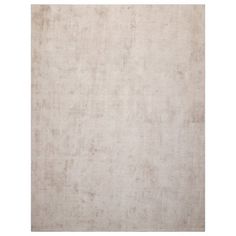 a white rug with some brown spots on the top and bottom of it, as well as