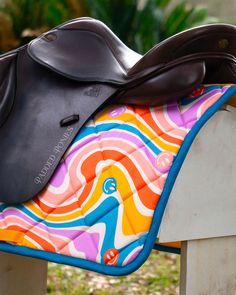 a saddle with a colorful design on it