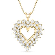 Delight her inner romantic with this breathtaking diamond heart pendant. Fashioned in sterling silver with 14K gold plate, this astounding choice showcases a polished heart-shaped outline surrounded in a dazzling double frame of 1/15 ct. round diamonds. Channel-set baguette-cut diamonds adorn the side edge to ensure sparkle from every angle. Resplendent with 4 cts. t.w. of diamonds and a bright polished shine, this pendant suspends along an 18.0-inch box chain that secures with a spring-ring cla Shadow Frame, Double Frame, Heart Pendant Diamond, Baguette Cut Diamond, Channel Set, Baguette Cut, Box Chain, Diamond Heart, Spring Rings