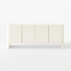 a white cabinet with four doors and three drawers on one side, against a white background