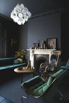 a living room filled with furniture and a fire place