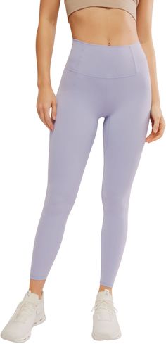 Introducing Free People's most essential legging yet. Featured in an ultra-smooth and soft-to-the-touch fabric that offers medium compression through any and all workouts. Designed to be your new go-to, these leggings are sleek, squat-proof, and sweat-wicking with a contoured high-rise waistband that holds you in as you move, plus it has a hidden front pocket. They’ve been tried, tested, and it’s true: leggings have never been better. Fit & Design: Sleek, high-rise silhouette Slightly cropped, 7 Coloured Leggings, Womens Athletic Outfits, Fp Movement, Best Leggings, Athletic Apparel, Active Wear Leggings, Athletic Outfits, Short Rompers, High Waisted Leggings