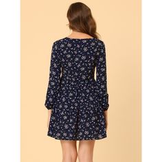 Designed with a pretty keyhole neckline with ties, fashion-forward puff sleeves, a waist-cinching fit, and a delicate floral print, the floral dress perfectly combined eye-catching features with a flattering fit. Layer yours over neutral-toned pieces to stave off the cold, and add suede boots to counter its femininity. Prove that florals aren't just for spring with the tiered dresses. Tiered Dresses, Summer Plaid, Keyhole Neckline, Womens Floral Dress, Dress Navy Blue, Dresses Floral, Mini Shirt Dress, Navy Blue Dresses, Tie Dress