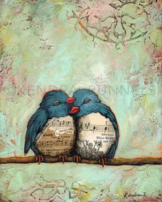 two blue birds sitting on top of a tree branch with music sheets in their beaks