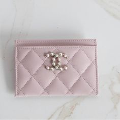 Authentic Chanel Pink Caviar Card Holder New Never Used Comes With Box, Dustbag , And Serial Card Super Rare And Absolutely Stunning! Has A Beautiful Special Pearl Cc Logo With Gold Hardware From The 21s Collection Color Is Light Pink Caviar Leather With Light Gold Hardware This Is A One Of A Kind Piece That Is Impossible To Find. Chanel Card Holder, Cc Card, Navy Chanel, Chanel Pink, Leather Trifold Wallet, Cute Wallets, Chanel Mini, Gold Chanel, Girly Bags