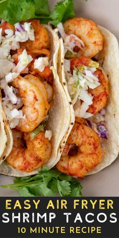 These Shrimp Tacos with Slaw are made in the air fryer and require just 10 minutes of work! This easy taco recipe is the perfect healthy, quick dinner! Shrimp Tacos In Air Fryer, Shrimp Tacos Air Fryer Recipes, Airfryer Shrimp Tacos, Air Fryer Shrimp Tacos With Cabbage Slaw, Low Carb Shrimp Tacos, Easy Shrimp Tacos Simple, Fast Air Fryer Meals, Shrimp Tacos Air Fryer, Keto Shrimp Tacos