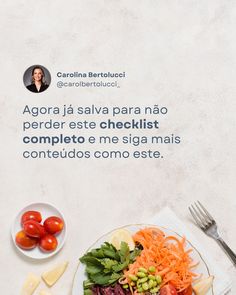 a white plate topped with salad next to a bowl of tomatoes and lettuce