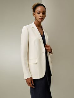 Discover the Silk Sleek Blazer, expertly tailored for a flawless fit. 
Featuring a cinched waist and elegant flared hem, 
crafted from luxurious silk crepe. Perfect for enhancing any professional or evening look. Silk Bedding Set, Crepe Blazer, Cream Blazer, Silk Knit, Silk Pajamas, Silk Charmeuse, Knitwear Tops, Silk Twill, Silk Crepe