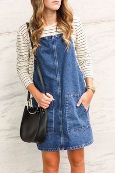 How to Style a Pinafore Dress - Twenties Girl Style  Pinafore Dress // Denim Dress // Overall Dress // Striped Top Denim Pinafore Dress Outfit, Dungaree Dress Outfit, Pinafore Dress Outfit, Jumper Dress Outfit, Denim Dress Outfit, Denim Pinafore Dress, Dress Sneakers, Denim Pinafore, Dress Booties