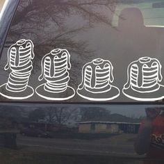 three stacks of pancakes sticker on the side of a car