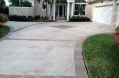 a large driveway in front of a house