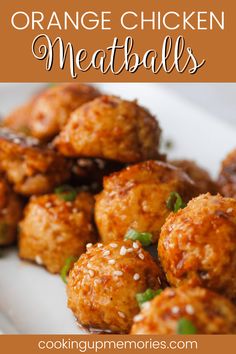 orange chicken meatballs on a plate with sesame seeds