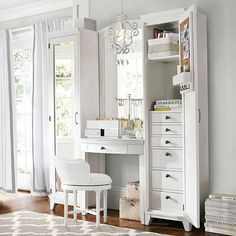 a white desk and chair in a room