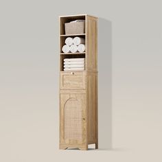 a tall wooden cabinet with towels and toilet paper on it's top shelf, against a gray background