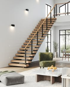 a living room filled with furniture and a stair case