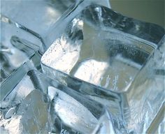 ice cubes with water and ice on them