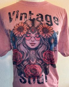 Boho vintage inspired design on our super soft and light weight unisex fit Bella Canvas shirt.  🌟Who We Are and Why You Should Choose Us As avid T-shirt enthusiasts we understand the importance of having that go-to tee that's not only comfortable but looks great too. Our premium tees are selected for both men and women.  💖Quality You Can Trust Our tees are made from high quality material, ensuring you get the perfect amount of comfort and style.  💯Superior Comfort Solid Color tees--100% cotton Heather Color tees--65/35 polyester/cotton Sweatshirts and Hoodies--50/50 cotton/polyester These premium materials are incredibly soft, durable, and easy to maintain by following the instructions below.  Please note: Due to having different brands in stock, the blend can slightly change.  🛒 How t Spring Festival Hippie T-shirt, Spring Hippie Retro Print T-shirt, Bohemian Pink Graphic Print T-shirt, Retro Letter Print Tops For Festival, Retro Festival T-shirt With Screen Print, Vintage Unisex T-shirt For Spring, Hippie Short Sleeve T-shirt For Music Festival, Retro Sublimation Print T-shirt, Unisex Vintage T-shirt For Spring