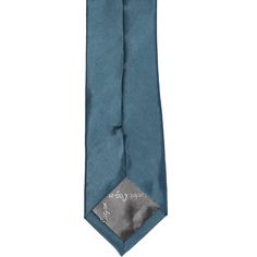 Get ready to be mesmerized by this loch blue tie. This tie is popular for weddings, thanks to its dusty blue and jewel-tone combination. The color pairs with black, gray and navy blue suits. We suggest a fitted suit to go along with the slim width. Speaking of the size, this tie is trimmed down at 2.5-inches wide. While certainly a skinny tie, it's not our skinniest size. A great in-between width that's modern and fashionable. The length is a standard 57-inches. We made it from durable polyester Blue Standard Tie For Formal Suit, Blue Formal Suit And Tie Accessories, Dapper Blue Standard Tie, Blue Fitted Suit And Tie Accessories For Black Tie, Blue Classic Wedding Suit And Tie Accessories, Dapper Blue Ties For Groom, Dapper Blue Wedding Ties, Blue Suit And Tie Accessories For Groom, Blue Wedding Suit And Tie Accessories